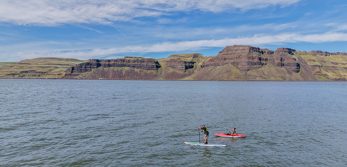 Greg with Adventure Fit showing off his balancing skills on a slightly choppy day on the Columbia River
